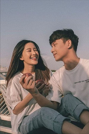 Korean Couple Sharing Apples in Soft Golden Hour Light HD phone wallpaper