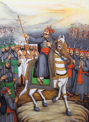 Historical painting of a Mughal emperor on horseback leading a massive army with elephants and soldiers in traditional attire HD phone wallpaper