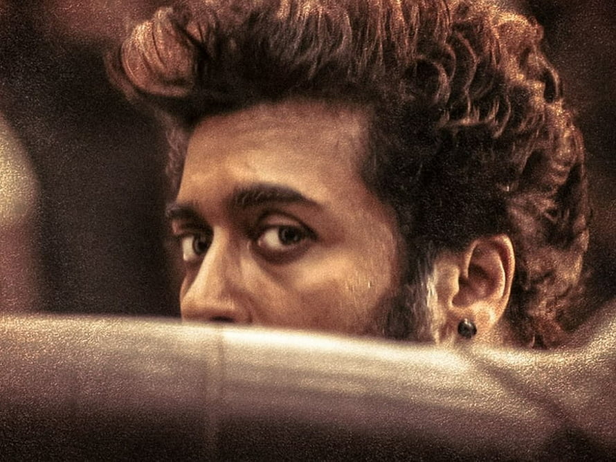 Suriya Intense Close-Up Portrait With Curly Hair And Earring HD wallpaper